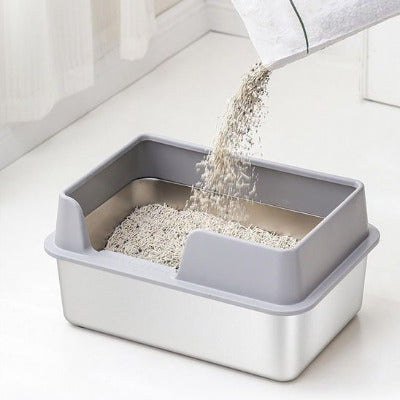 remplissage de bac à litière pour chat