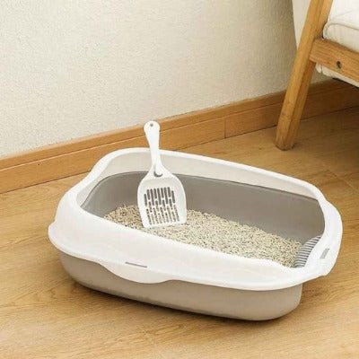  bac à litière pour chat gris avec une pelle 