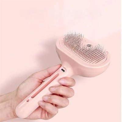 brosse à chat a vapeur Rose