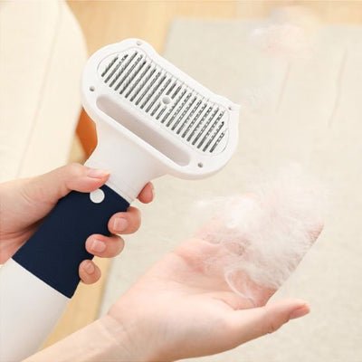Brosse à chat aspirateur retirant les poils du chat