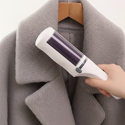brosse attrape poils chat sur manteau