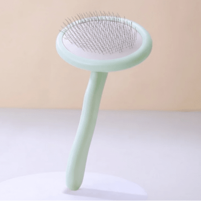 brosse pour chat à poil long vert pastel