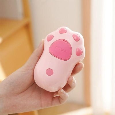 présentation d'une Brosse pour chat rose